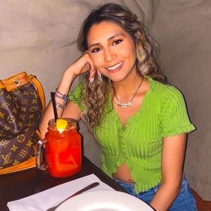 Cripple ruffled green top